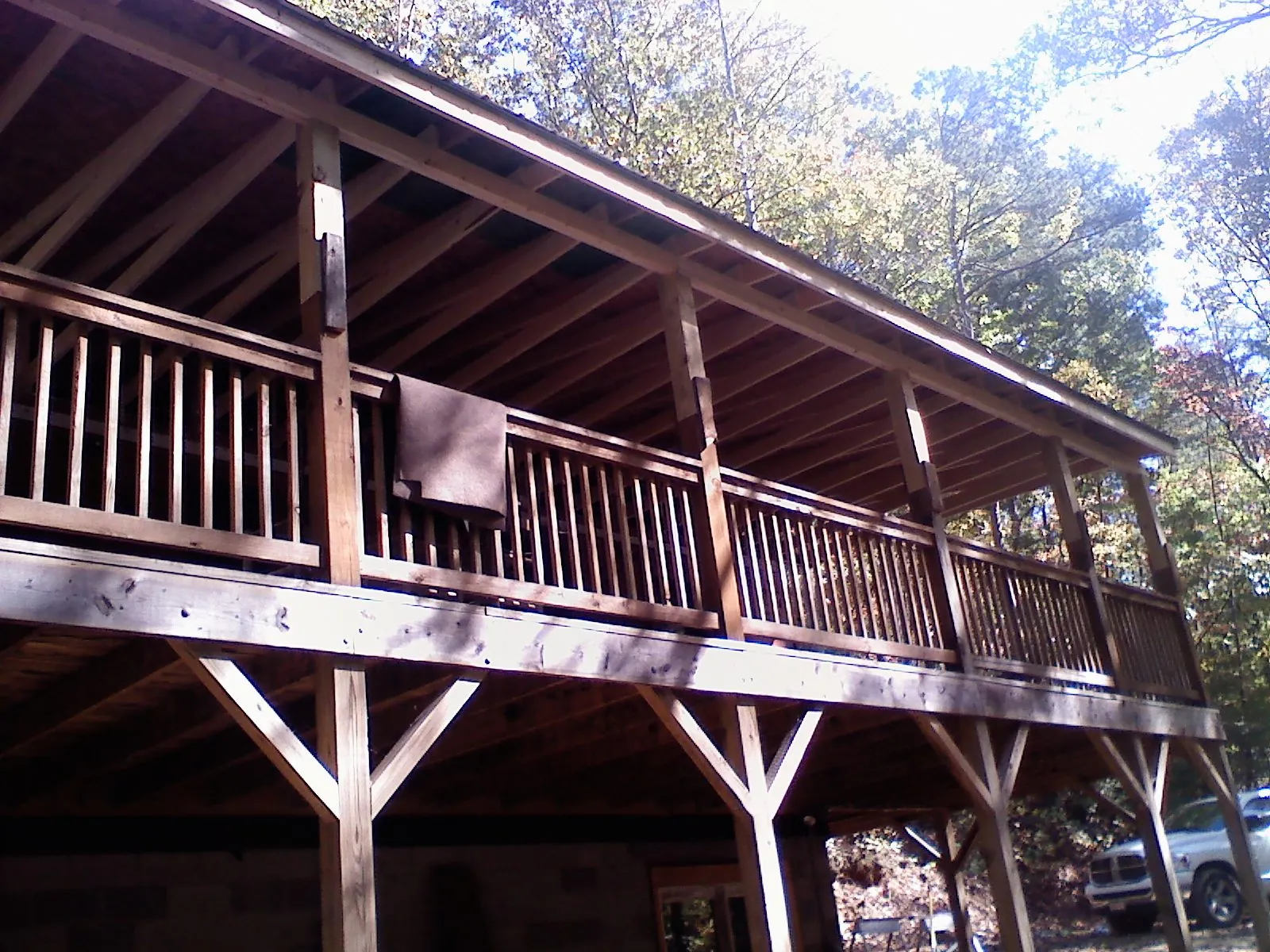 Timber framing under a new elevated porch and deck — Roof Leak Repair in Walbridge by Roofing Brothers